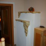 Zusatz-Kachelofen wärmt auch den Flur